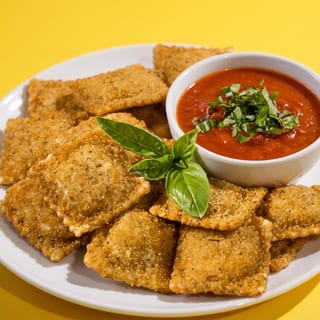 Fried Cheese Ravioli with Sauce
