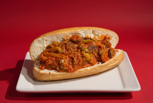 Sausage & Peppers Parmigiana Sub.